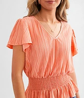 Plisse Peplum Top