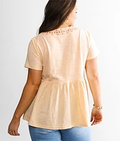 Embroidered Peplum Top