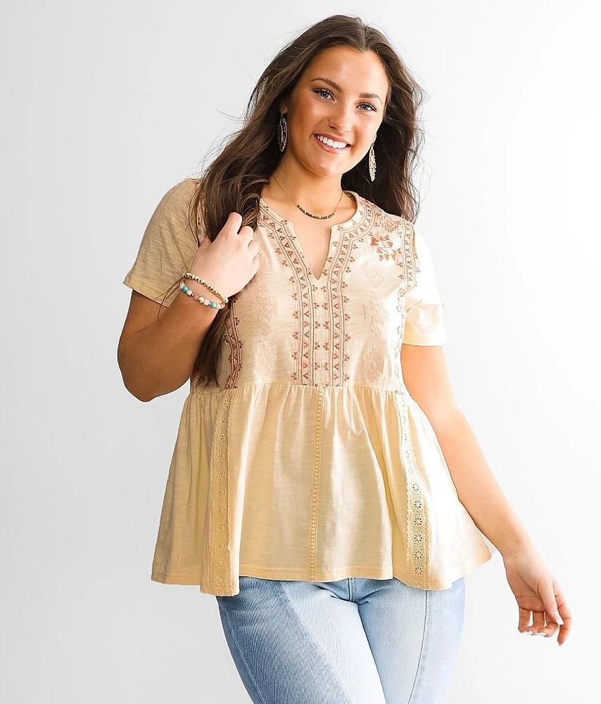 Embroidered Peplum Top