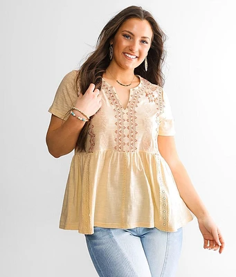Embroidered Peplum Top