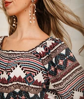 Metallic Peplum Top