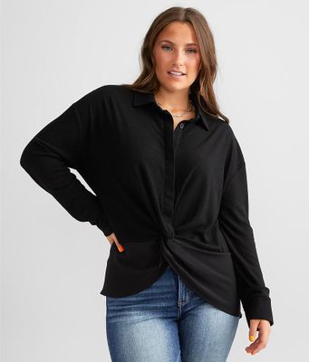 Buckle Black Pieced Knit Blouse