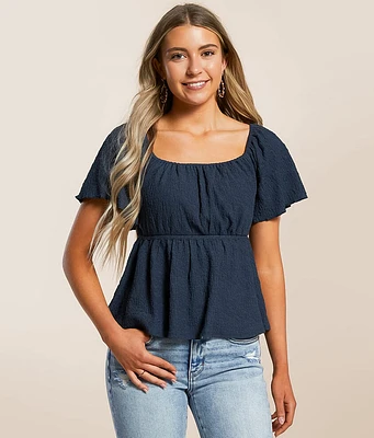 Textured Back Tie Peplum Top