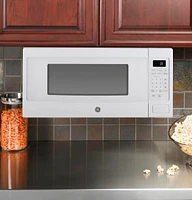 GE - Profile Series 1.1 Cu. Ft. Mid-Size Microwave - White on White