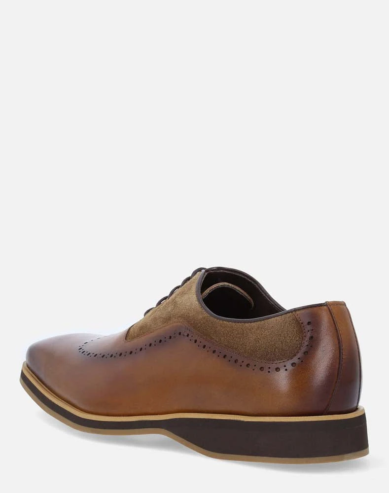 Zapato oxford cuero en piel picada con picado para hombre