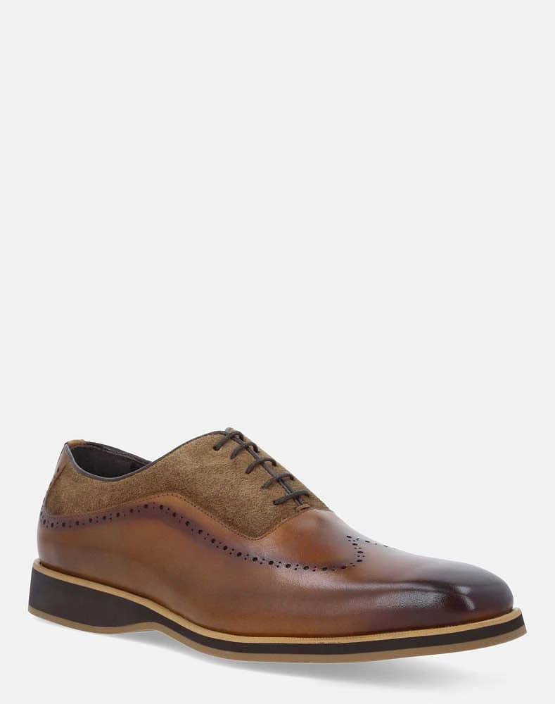 Zapato oxford cuero en piel picada con picado para hombre