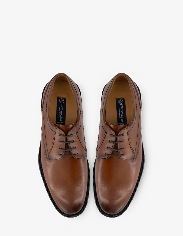 Blucher en piel napa color cuero con calado para hombre