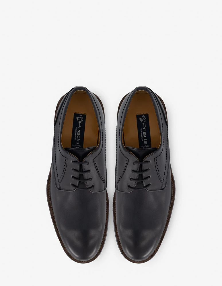 Blucher en piel napa color negro con calado para hombre