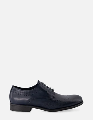 Zapato Blucher en piel color azul con picado para hombre