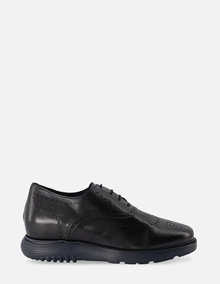 Oxford +7 en piel color negro con picado para hombre