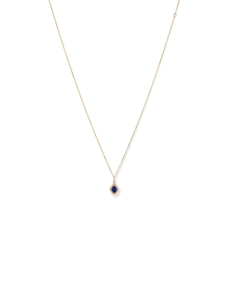 Pear Cut Created Sapphire and Diamond Halo Pendant Necklace in 10kt Yellow Gold