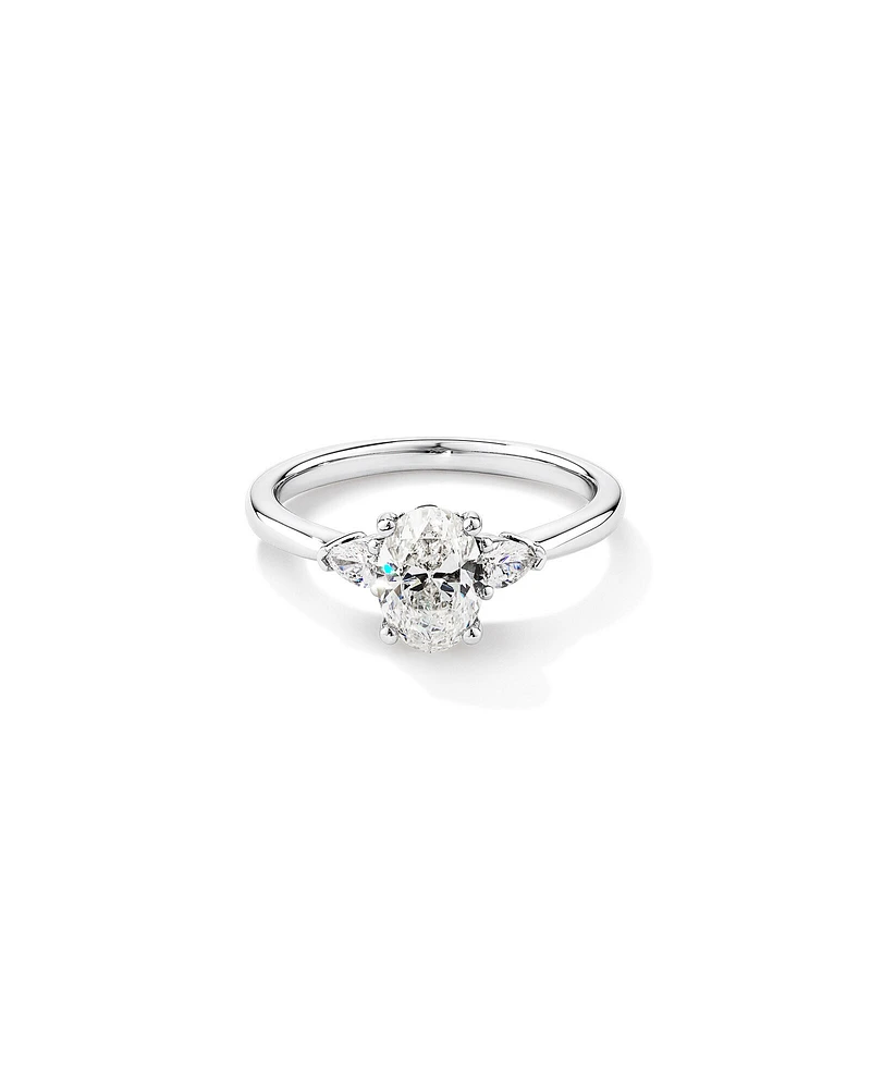 1.10 Carat TW Oval & Pear Cut Three Stone Engagement Ring in 18kt White Gold