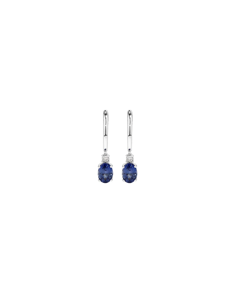 Oval Cut Blue Created Ceylon Sapphire Gemstone and Diamond Drop Huggie Earrings in Sterling Silver