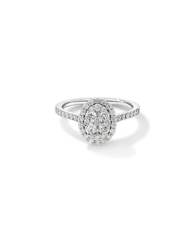 0.86 Carat TW Oval Shaped Cluster Diamond Halo Engagement Ring in 14kt White Gold