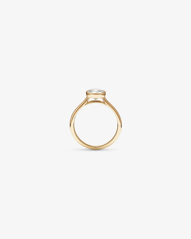 1.25 Carat TW Round Brilliant Laboratory-Grown Diamond Solitaire Bezel Set Engagement Ring in 14kt Yellow Gold