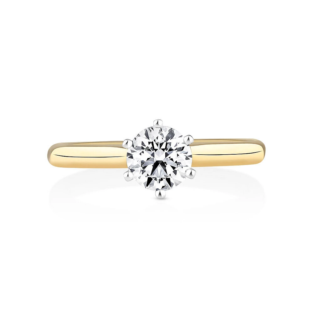 Certified Solitaire Engagement Ring with a 3/4 Carat TW Diamond in 18kt White Gold