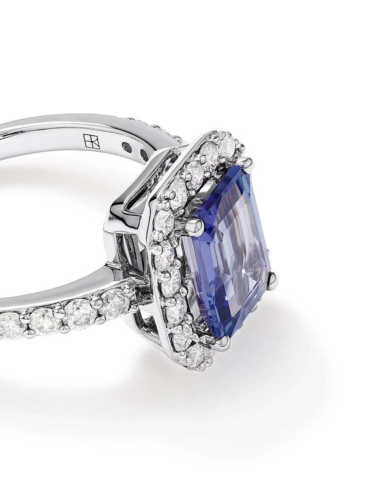 Emerald Cut Blue Tanzanite Gemstone and 0.75 Carat TW Diamond Halo Ring in 14kt White Gold