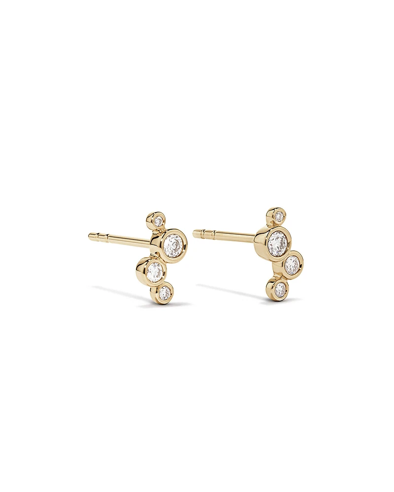 0.15 Carat TW Round Brilliant Graduated Diamond Bezel Set Stud Earrings in 10kt Yellow Gold