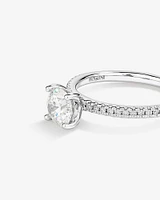 1.14 Carat TW of Diamonds Engagement Ring with a 1 Carat Round Centre Laboratory-Grown Diamond and shouldered by 0.14 Carat TW of Natural Diamonds in 14kt White Gold