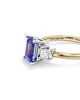 Bague en or blanc et jaune 10 K avec tanzanite et diamants totalisant 0,40 ct