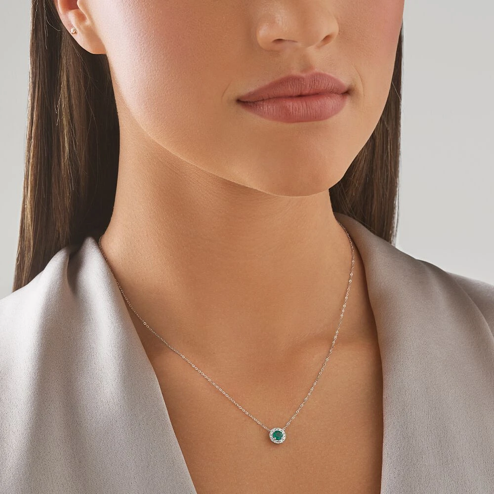 Halo Pendant with Emerald & 0.14 Carat TW of Diamonds in 10kt White Gold