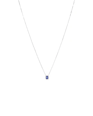 Emerald Cut Blue Tanzanite and 0.17 Carat TW Diamond Halo Pendant in 14kt White Gold