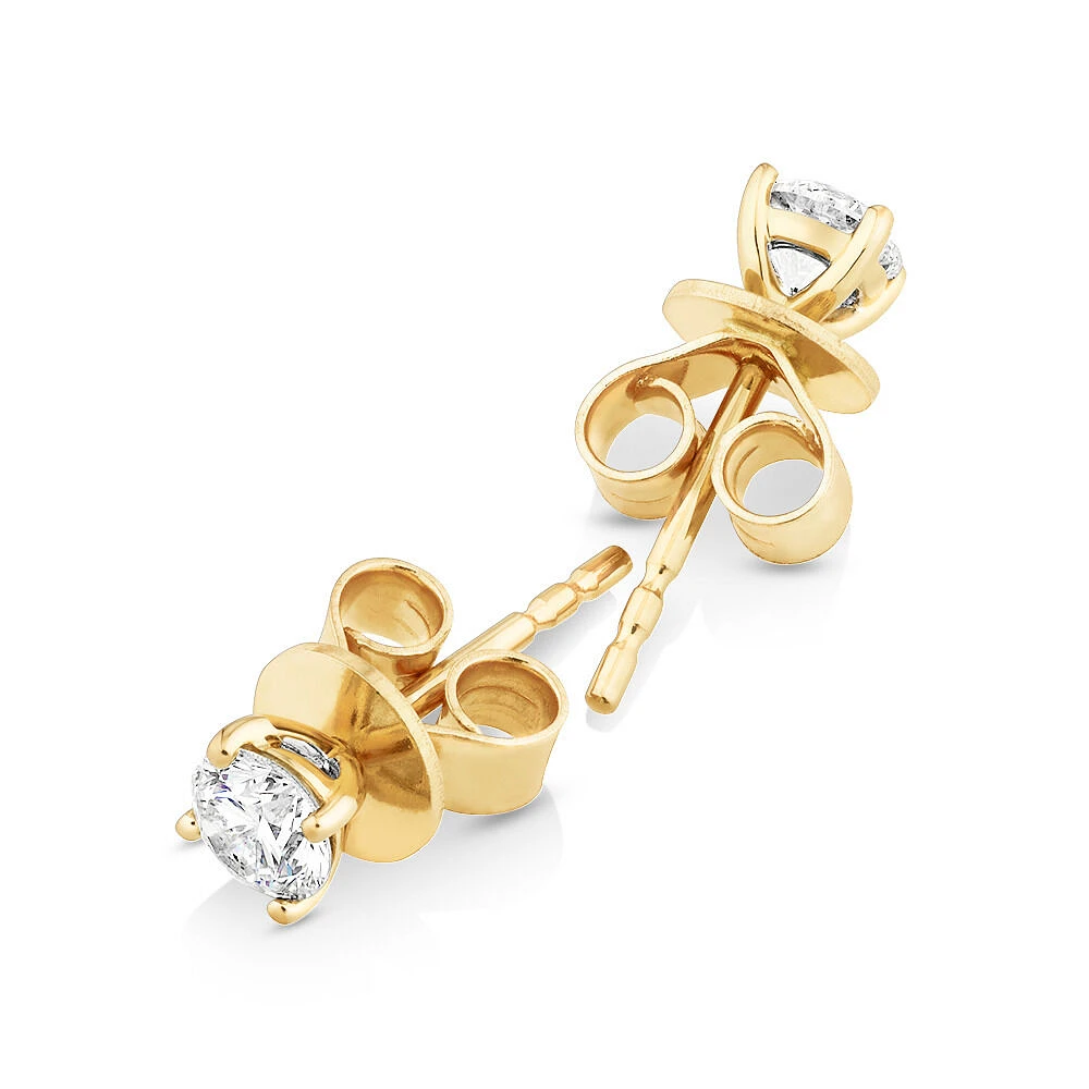 0,50 Carat TW Boucles d'oreilles puces solitaires en or blanc 18kt