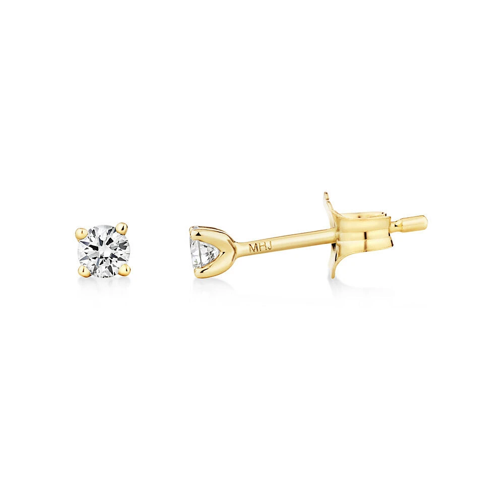 Boutons d'oreilles en or jaune 10 K ornés de diamants totalisant 0,15 ct