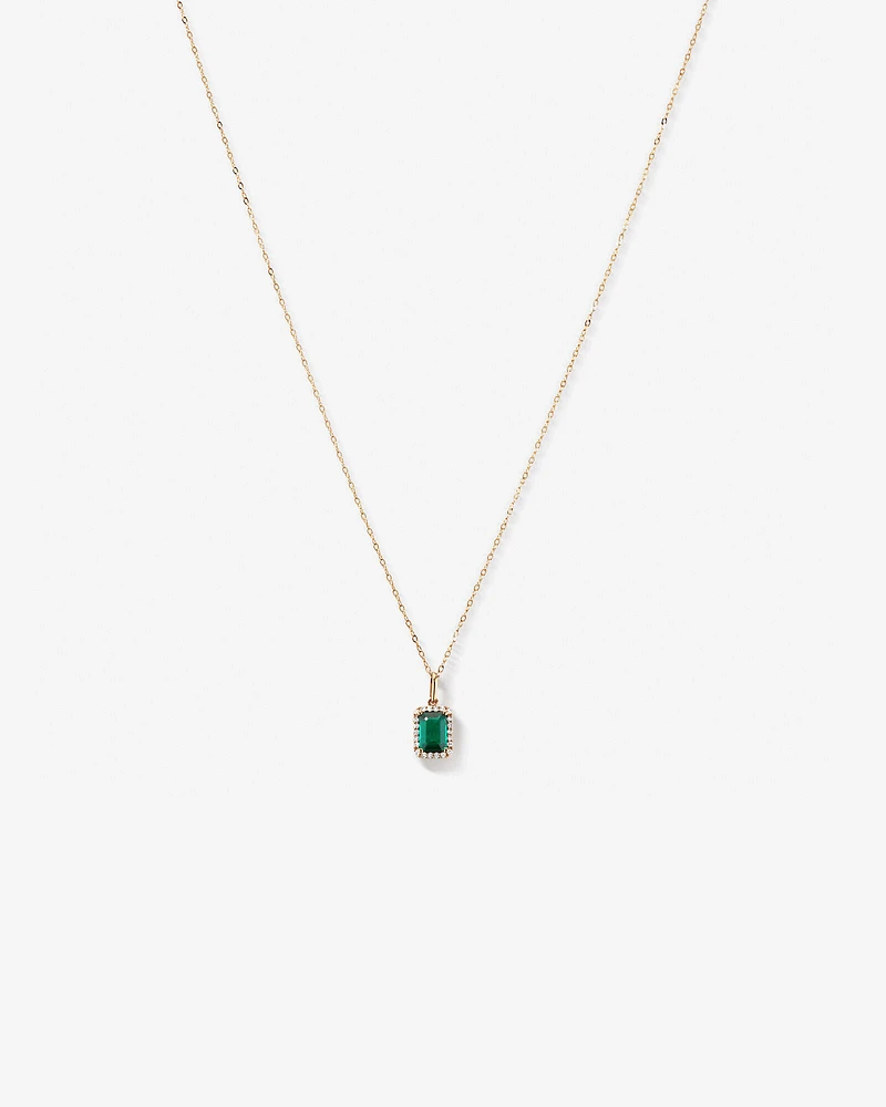 Pendentif en or jaune 10 carats avec chaîne et émeraude verte synthétique taillée en émeraude et halo de diamants