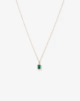 Pendentif en or jaune 10 carats avec chaîne et émeraude verte synthétique taillée en émeraude et halo de diamants