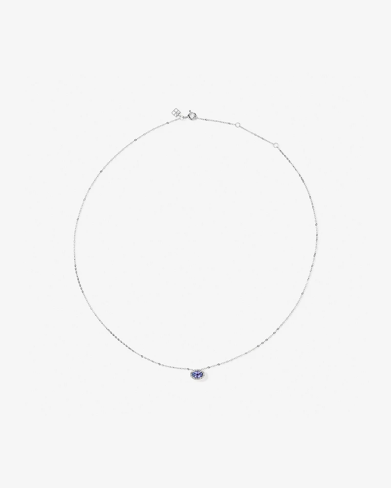 Oval Cut Blue Tanzanite Gemstone and 0.08 Carat TW Diamond Halo Pendant Necklace in 10kt White Gold