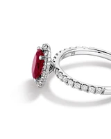 Oval Cut Red Ruby Gemstone and 0.60 Carat TW Diamond Halo Ring in 14kt White Gold