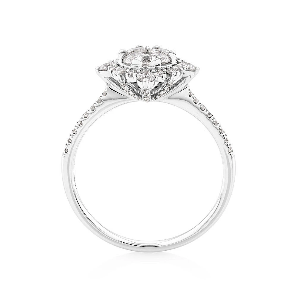 Halo Engagement Ring with .79TW of Diamonds in 14k White Gold