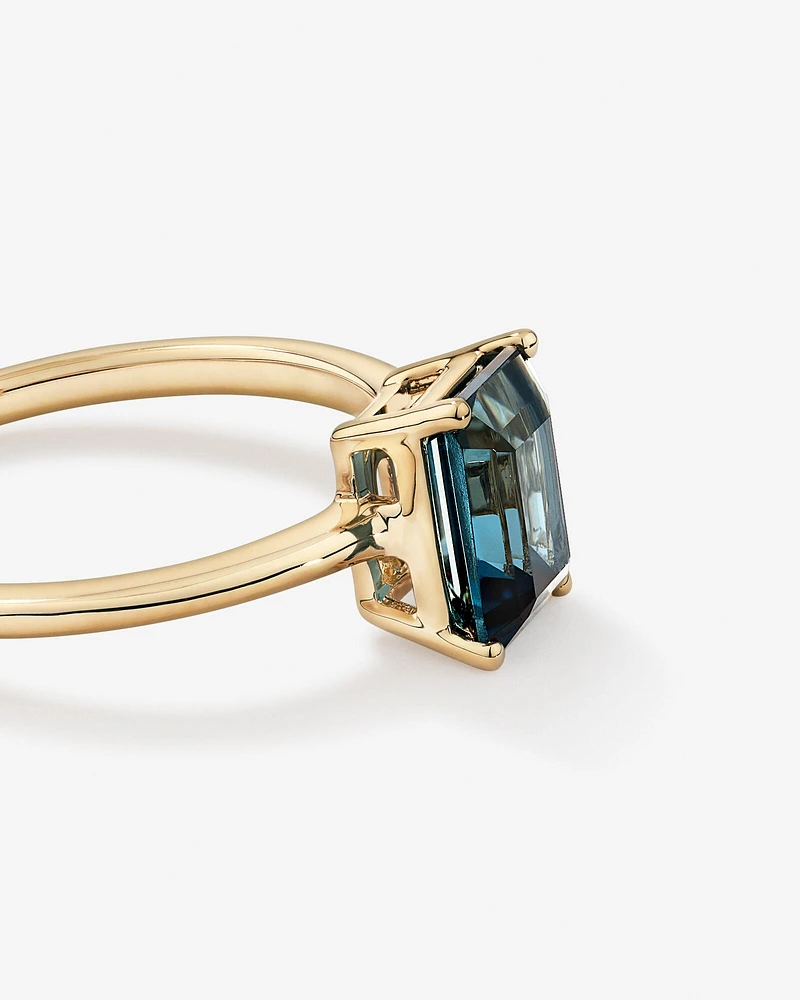 Emerald Cut London Blue Topaz Gemstone Solitaire Ring in 10kt Yellow Gold