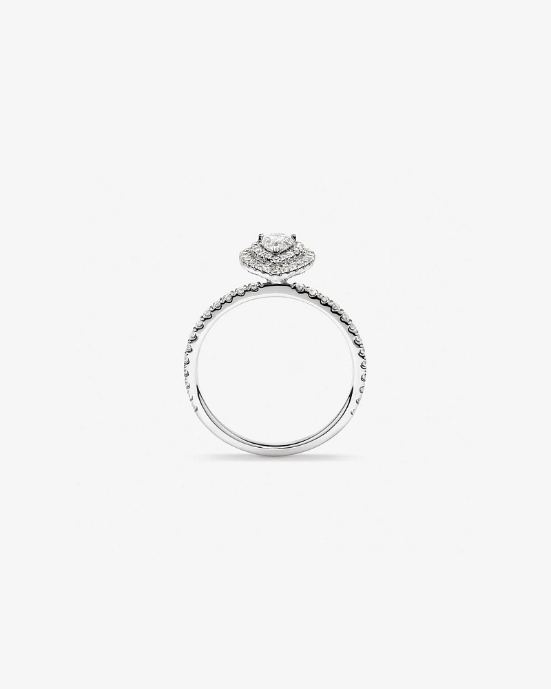 0.87 Carat TW Pear Cut Diamond Halo and Engagement Ring in 14kt White Gold