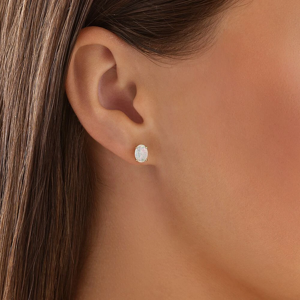 Stud Earrings with Opal in 10kt Yellow Gold