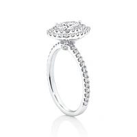 Halo Ring with 0.90 Carat TW of Diamonds in 18kt White Gold