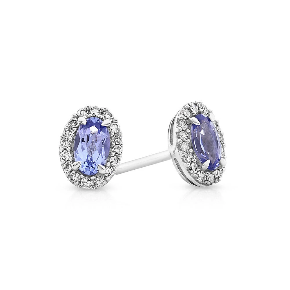 Halo Stud Earrings with Tanzanite & 0.12 Carat TW Of Diamonds in 10kt White Gold