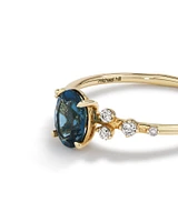 Ring with Blue Topaz and 0.12 Carat TW of Diamonds 10kt Yellow Gold