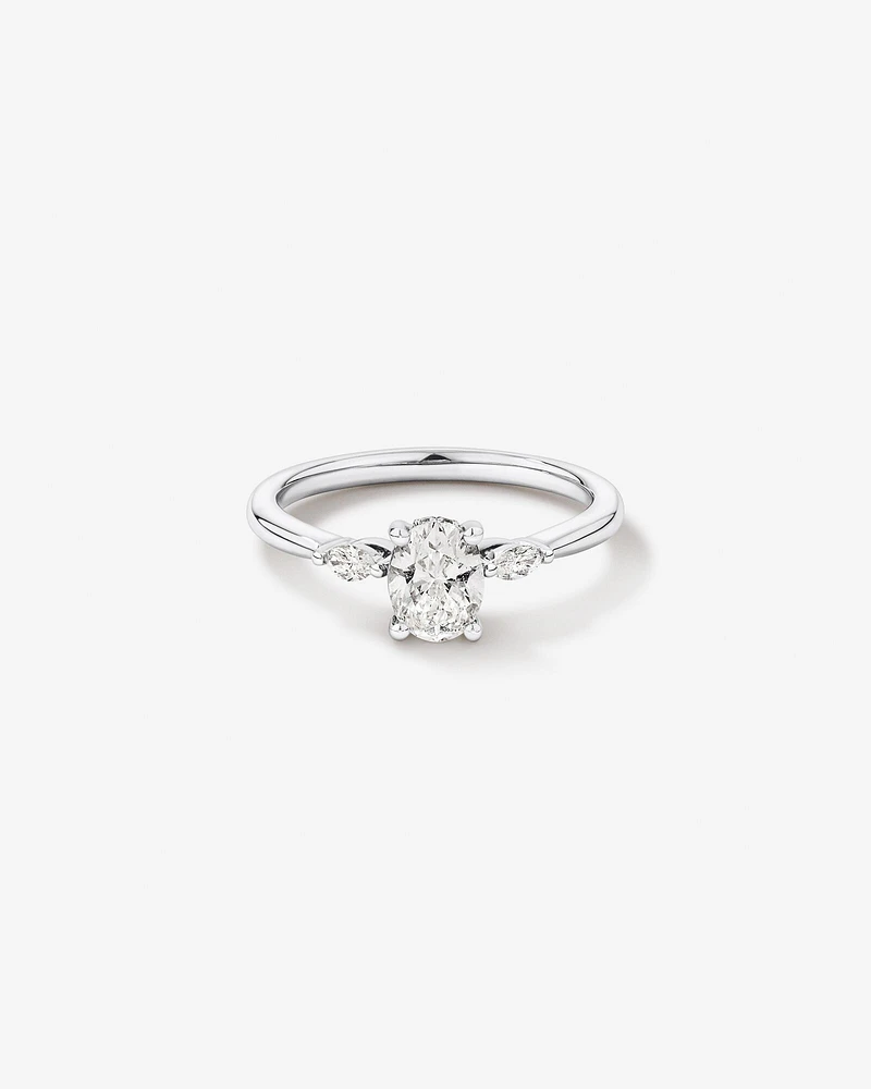 0.77 Carat TW Three Stone Oval and Marquise Cut Hidden Halo Engagement Ring in Platinum