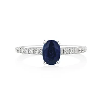 Solitaire Sapphire Ring with 0.25 Carat TW of Diamonds in 10kt White Gold