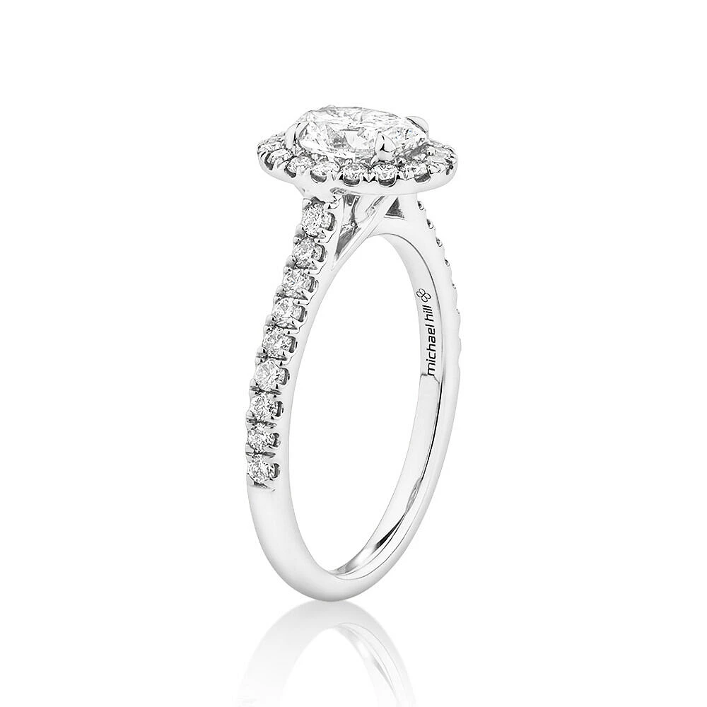 Oval Halo Ring with 1.38 Carat TW of Diamonds in 14kt White Gold