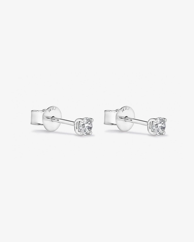 0,25 Carat TW Boucles d'oreilles puces solitaires en or blanc 18kt