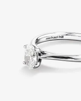 0.50 Carat TW Oval Solitaire Engagement Ring in 14kt White Gold