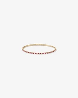 0.35 Carat TW Diamond and Pink Sapphire Gemstone Flex Oval Bangle in 10kt Yellow Gold