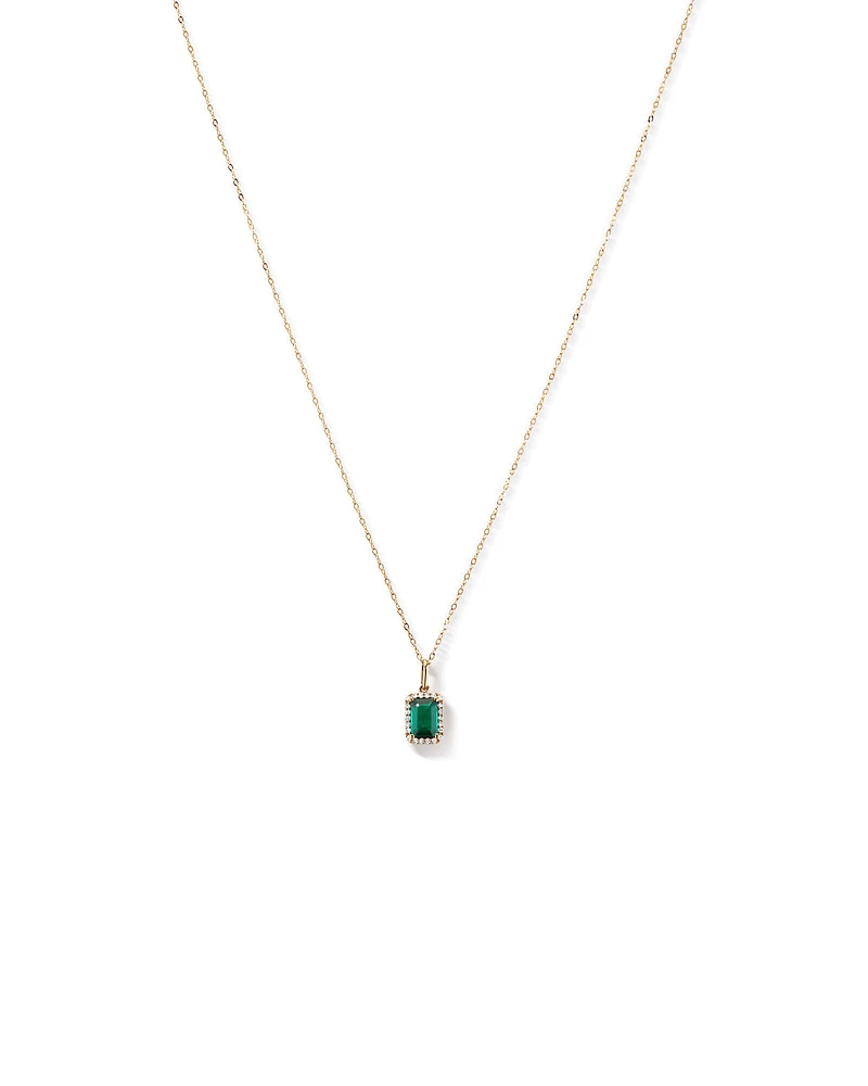 Pendentif en or jaune 10 carats avec chaîne et émeraude verte synthétique taillée en émeraude et halo de diamants