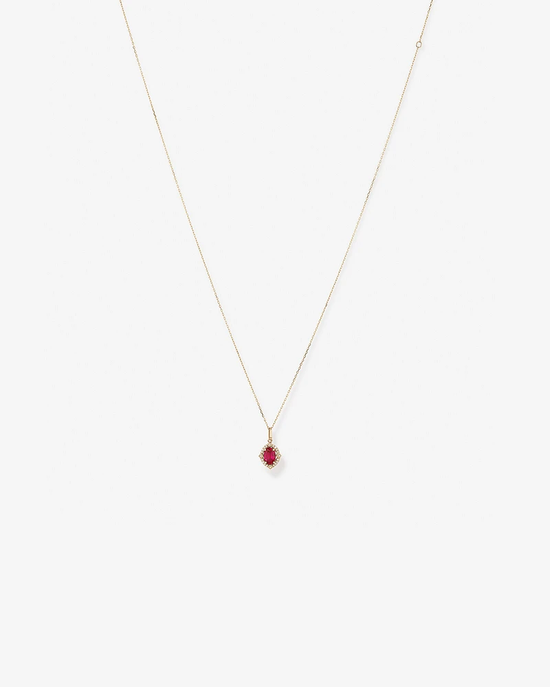 Oval Cut Created Ruby and Diamond Halo Pendant Necklace in 10kt Yellow Gold