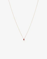 Pear Cut Red Ruby Gemstone and 0.05 Carat TW Diamond Halo Necklace in 10kt Yellow Gold