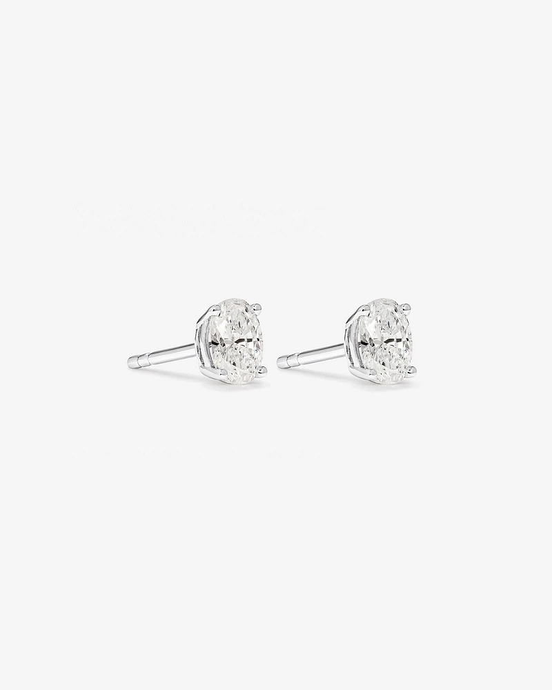 0,50 Carats TW Boucles d'oreilles solitaires diamant taille ovale en or blanc 18kt