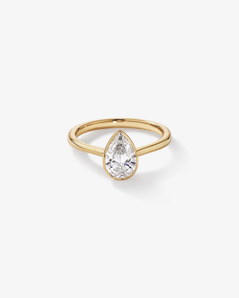 1.25 Carat TW Pear Cut Laboratory-Grown Diamond Solitaire Bezel Set Engagement Ring in 14kt Yellow Gold